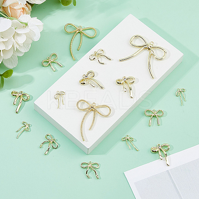 42Pcs 7 Styles Bowknot Alloy Pendants FIND-DC0007-72B-1