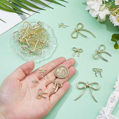 42Pcs 7 Styles Bowknot Alloy Pendants FIND-DC0007-72B-1