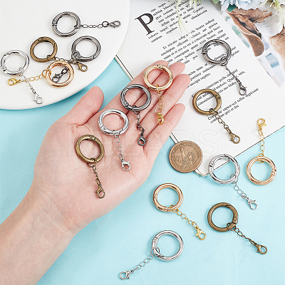 16Pcs 4 Colors Alloy Spring Gate Rings HJEW-AB00522-1